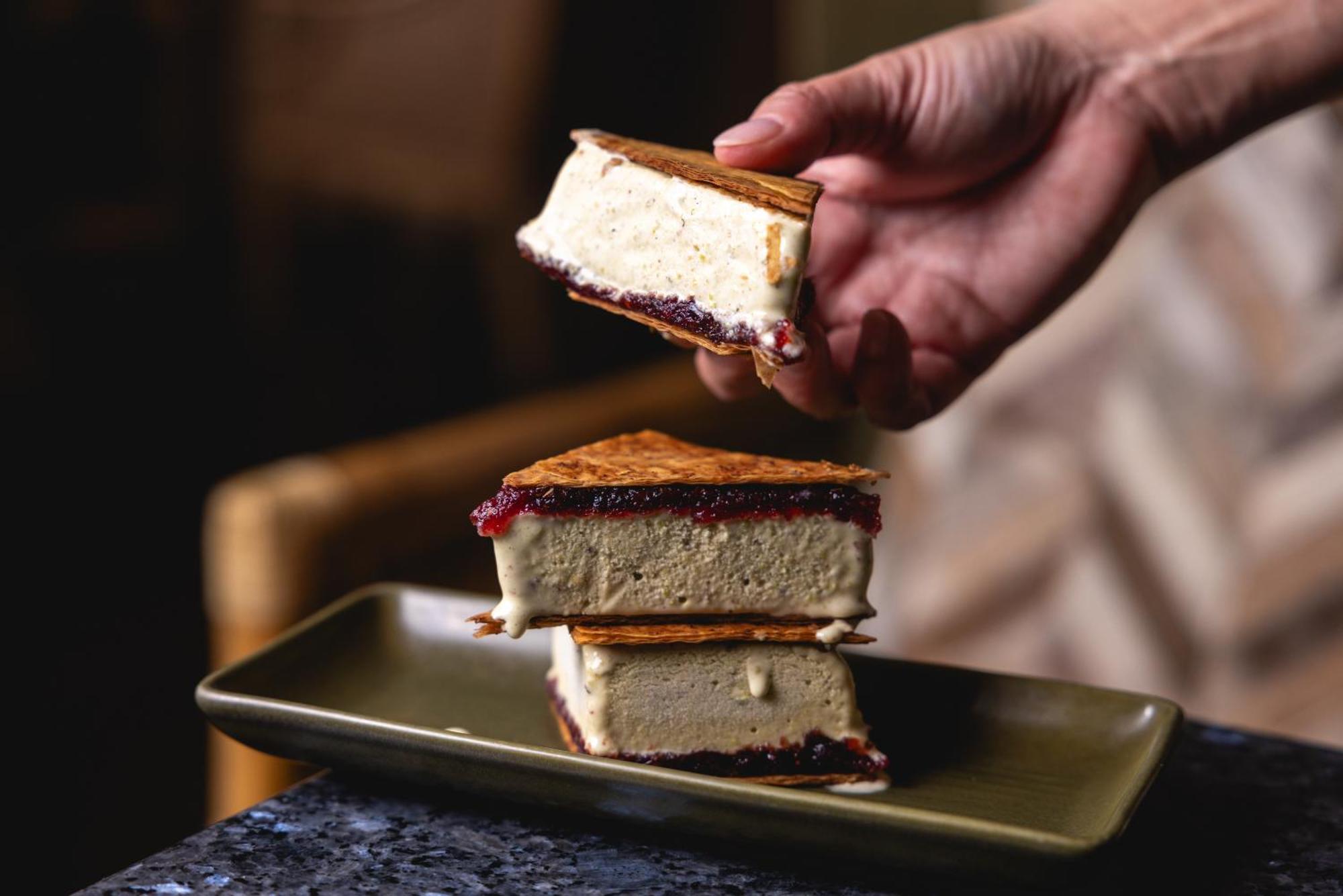 Ovolo The Valley Brisbane Exterior foto A hand holding a piece of ice cream sandwich